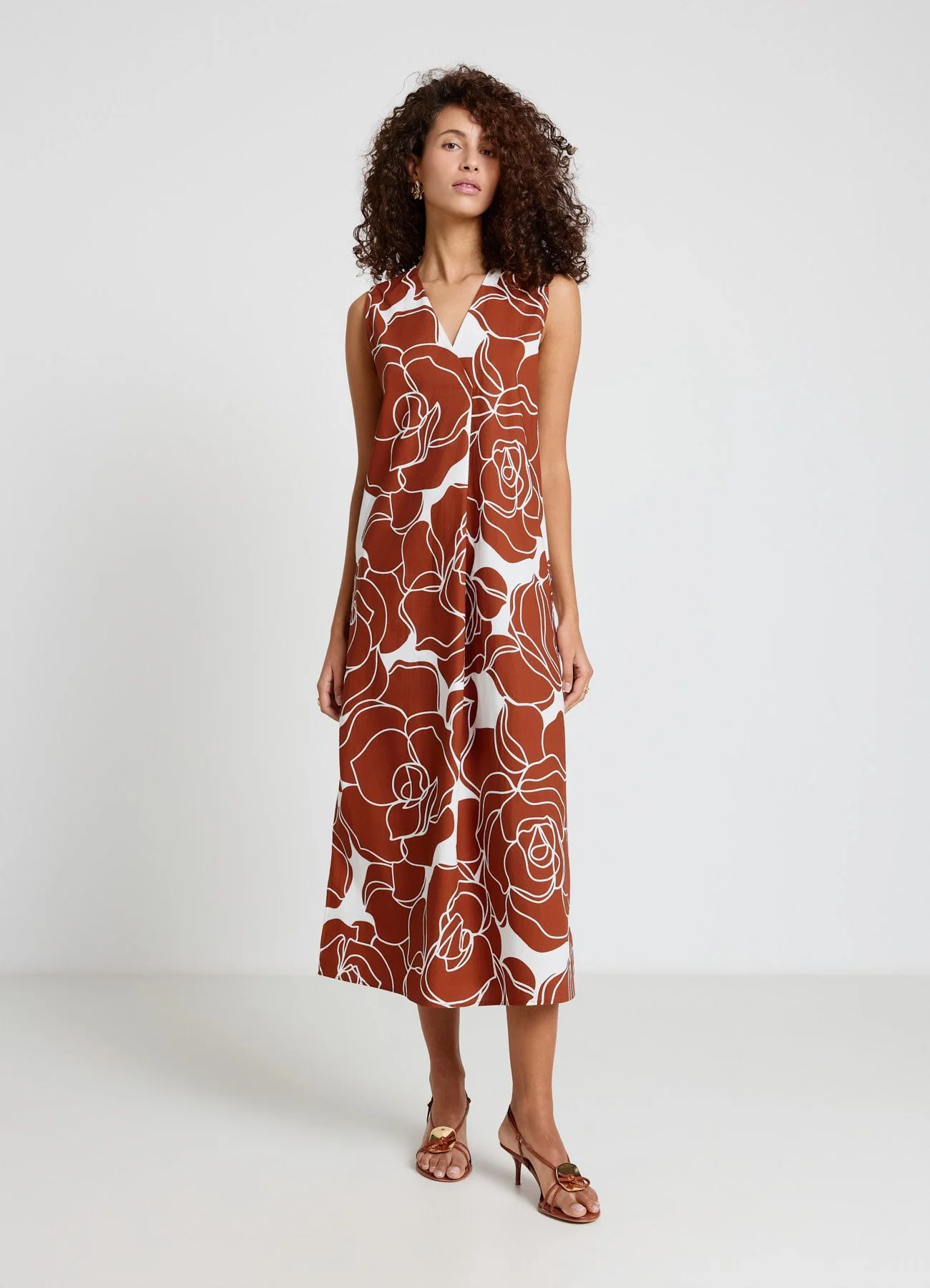Vestito lungo smanicato con stampa fiori